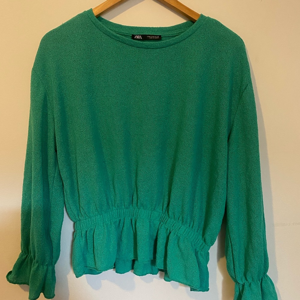 Peplum green sweater